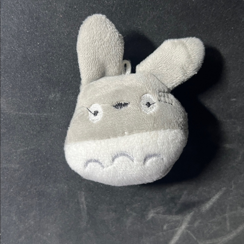 Gray and White Plush Toy